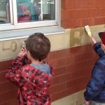 Student love to paint words on the wall with water